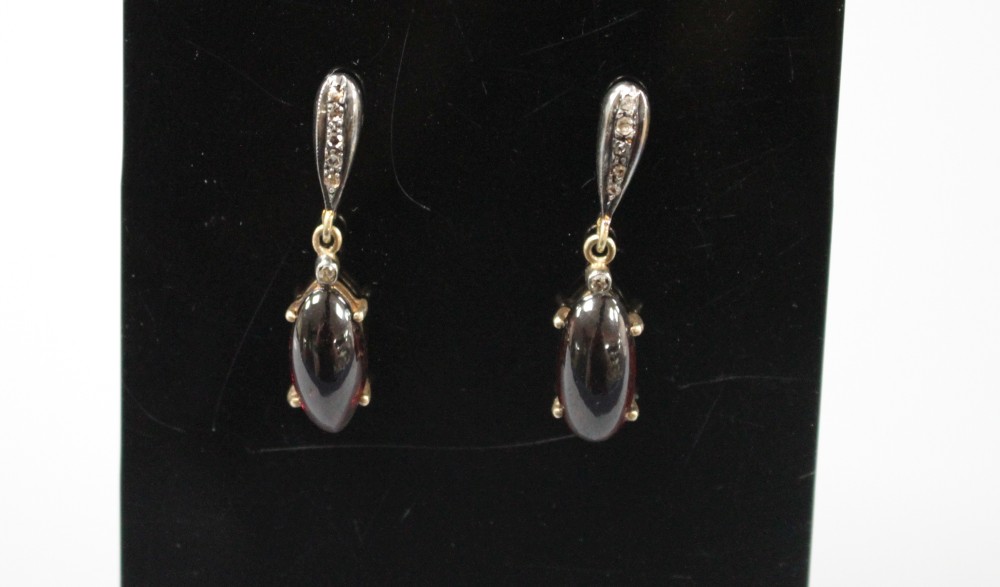 A pair of Victorian style 18k and 925, cabochon garnet and diamond set drop earrings, 31mm, gross weight 5.3 grams.